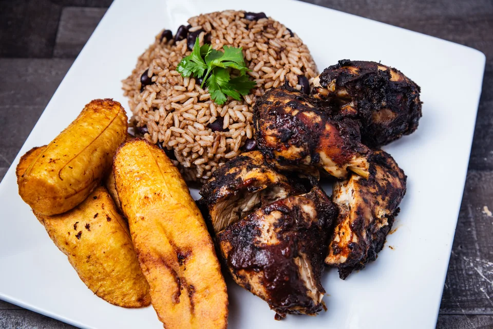 Example photo: Jerk chicken with rice and fried plantain