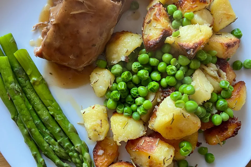 Example photo: Roast pork with gravy, roast potatoes, peas and asparagus
